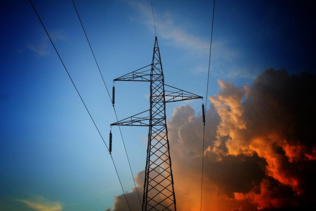 Electric transmission tower in nice dramatic sky background